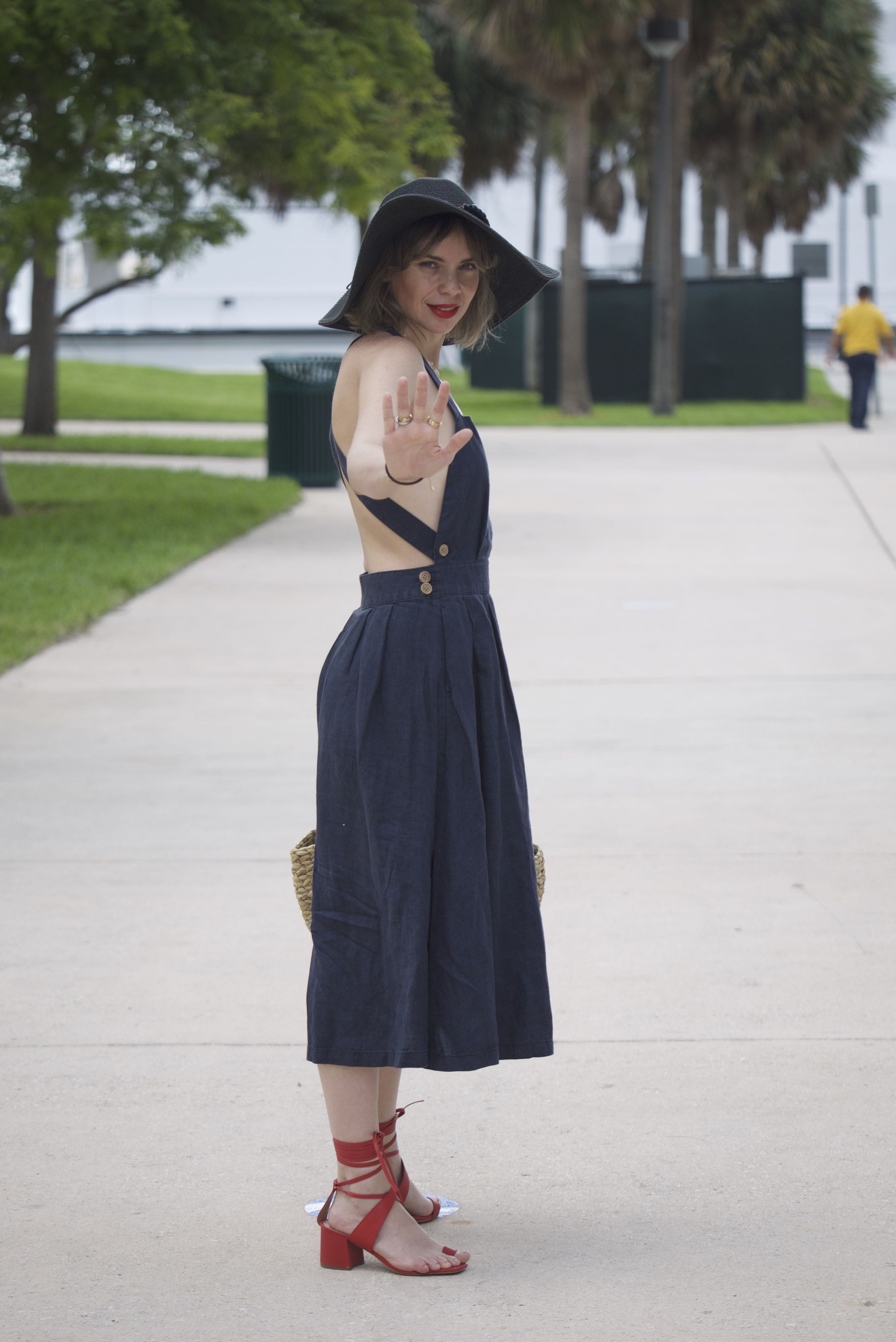 Alba Marina fashion blogger from Mylovelypeople blog is wearing a linen dress from Mango and red block heels from Freepeople.