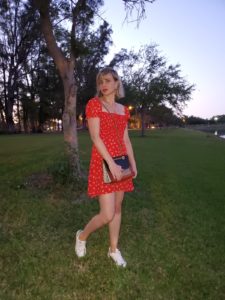 Alba Marina Otero fashion blogger from Mylovelypeople blog shares with you what she wore for Easter, a Faithfull The brand red dress with white sneakers, a leather Coach bag, golden necklaces and statements earrings as accessories