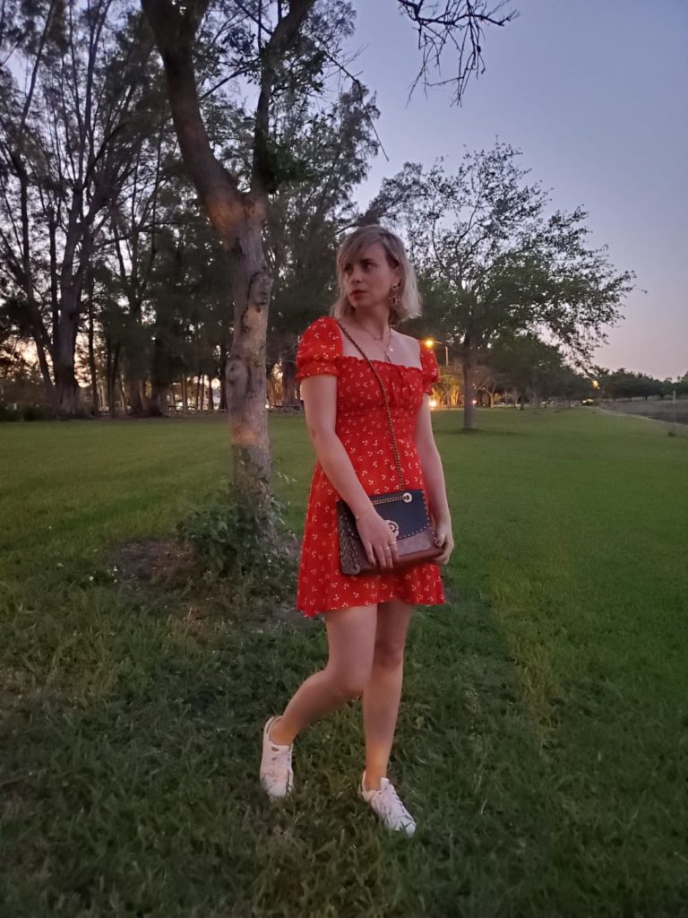 Alba Marina Otero fashion blogger from Mylovelypeople blog shares with you what she wore for Easter, a Faithfull The brand red dress with white sneakers, a leather Coach bag, golden necklaces and statements earrings as accessories